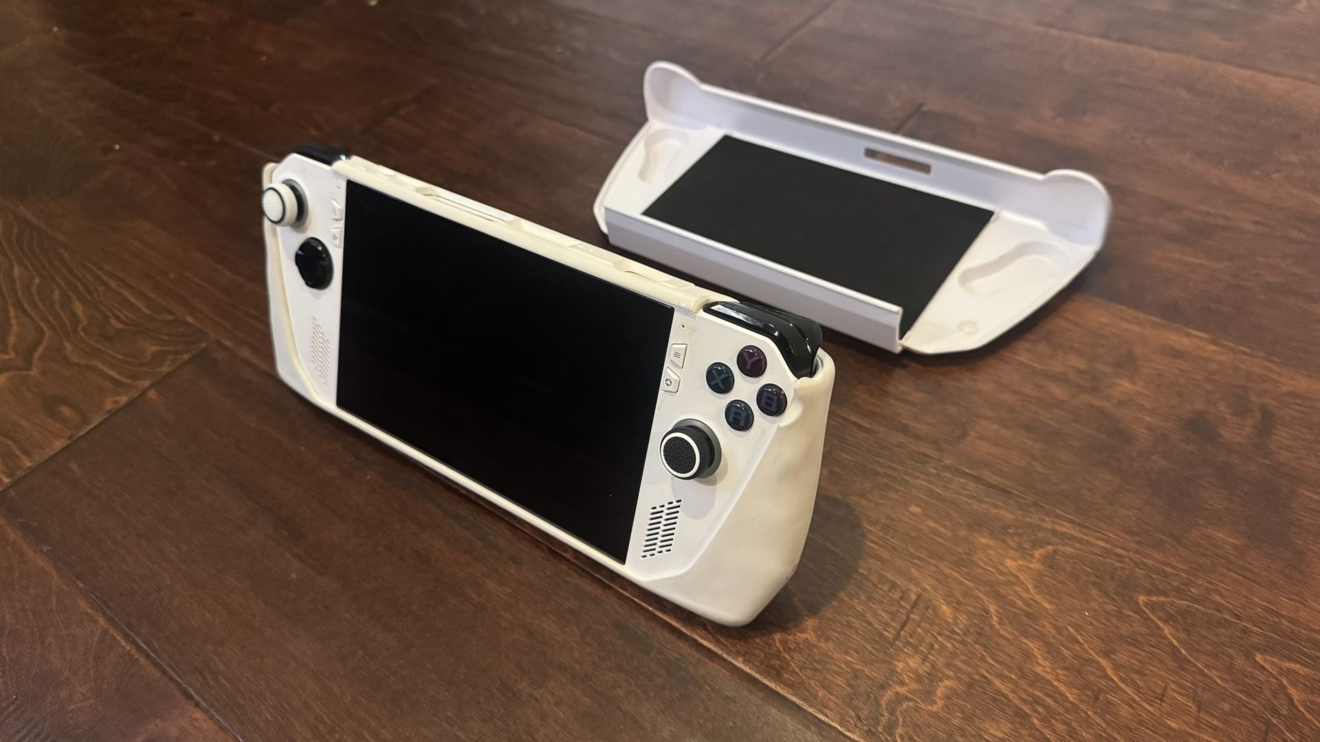 Asus ROG Ally (Includes hard Shell case + 65W Charger)