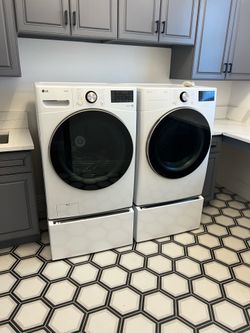 LG Washer and Dryer Side By Side W/ Stands