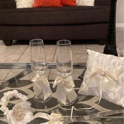 Ring Pillow, garter, wine cups, and cake knives