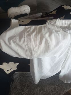 White outfit new never worn it is a large but fits like a medium