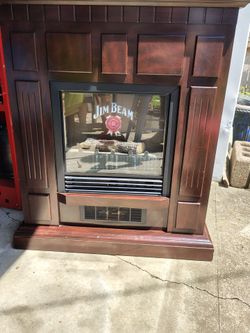 Cherry wood electric fireplace branded with Jim Beam