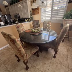 Round dining room table and 4 chairs