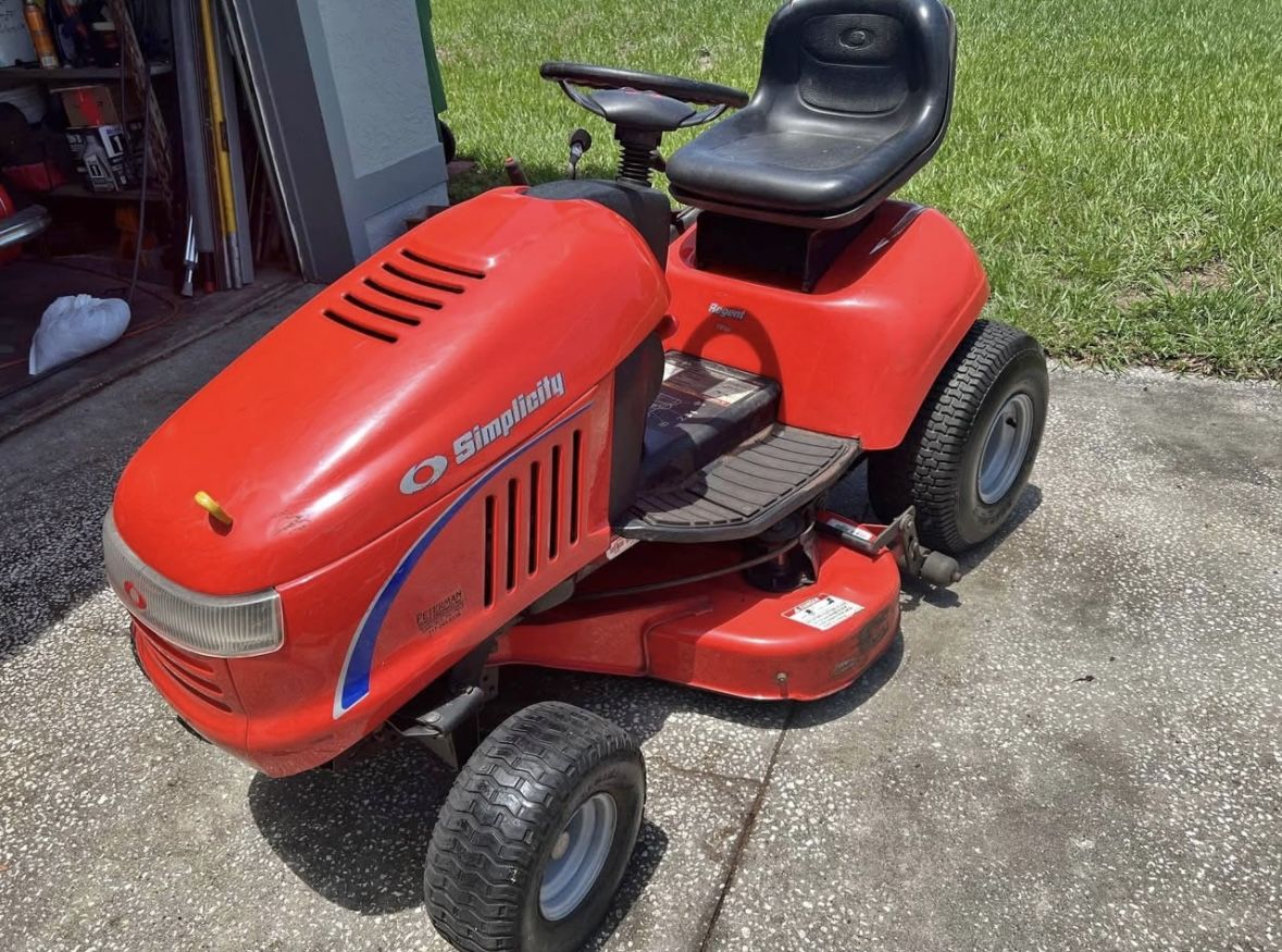 Simplicity Riding Mower with 38 inch deck 18 hp Briggs and Stratton engine.
