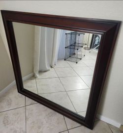 48 in by 48-in hanging wall mirror with a 4-in wood trim