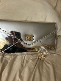 New silver purse