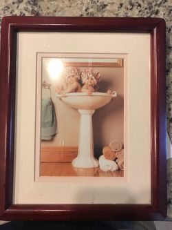 Framed and matted Anne Geddes baby picture