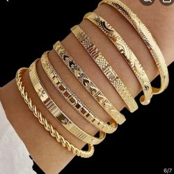Gold bangles five dollars each also in silver