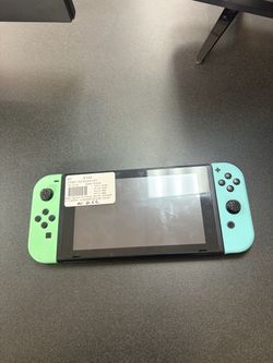 Nintendo Switch with Green and Blue Joy-Cons
