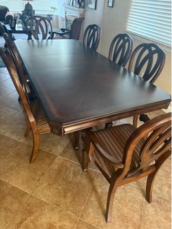 Real wood dining table w/ 8 chairs