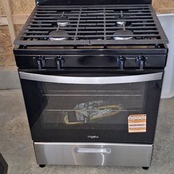 Whirlpool 4 burner gas range.