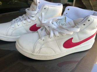 Nike White Mid-Top Sneakers with Red Swoosh
