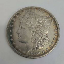 1884 MORGAN ONE DOLLAR SILVER COIN 