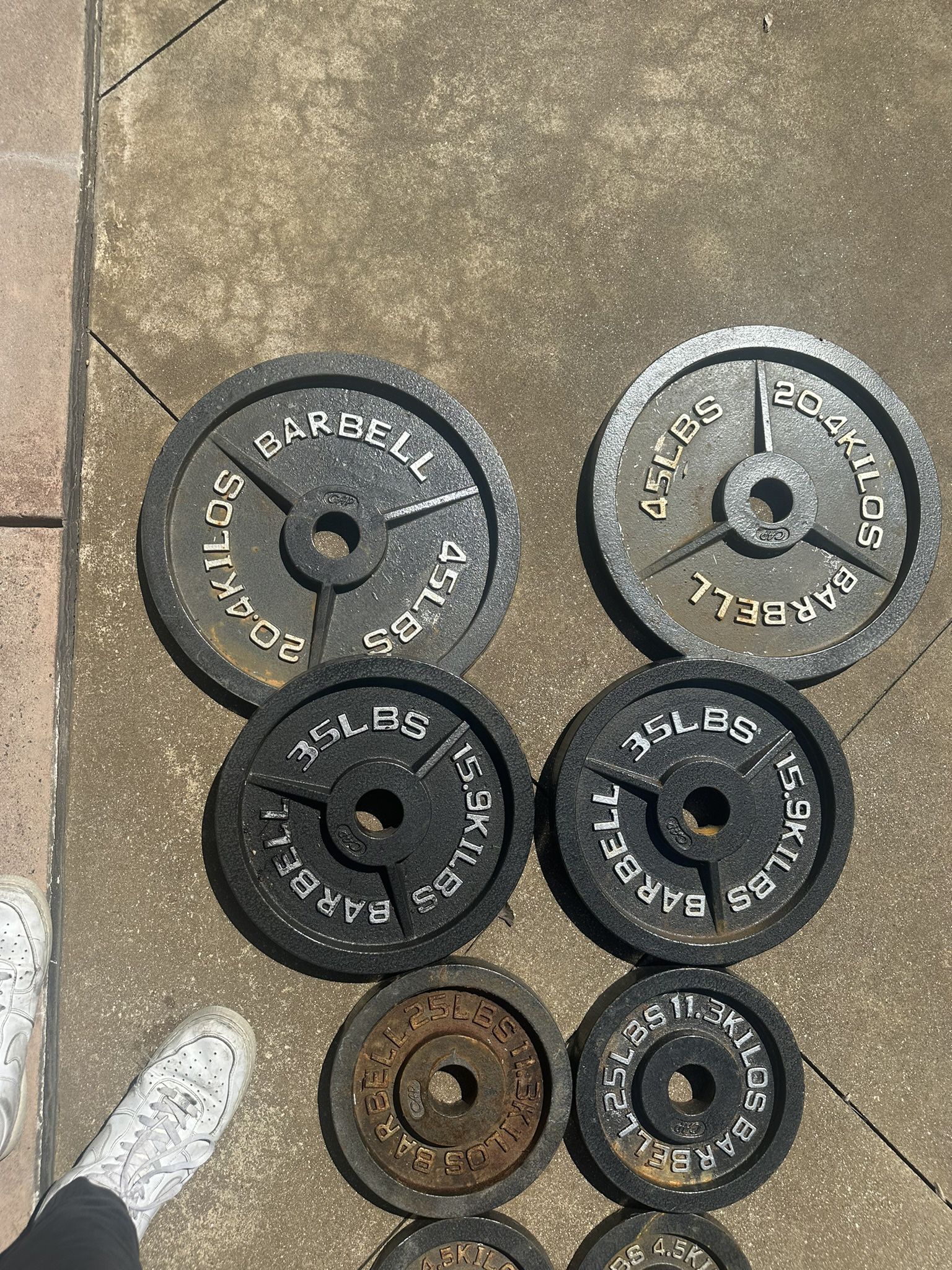 Set Of Weights And Bench Press 