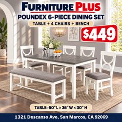 Bring the family together around this stylish gray and white dining set. It includes a spacious table, 4 chairs with cushioned seats, and a matching u