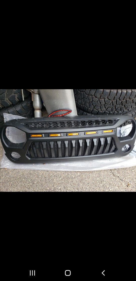 2016 jeep grill with amber lights and new brakes.