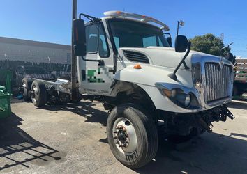 2015 International 7400, cab and chassis triple axle.