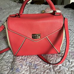Kate Spade Pink and Cream Handbag Cow Leather Perfect For Many Occasions. Medium Size Gold Latch. Adjustable/Detachable Strap Measure 10.5” L   8.5”H 