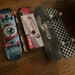 Two Brand new Boards One Kinda Used Board And A Brand New Razor Scooter