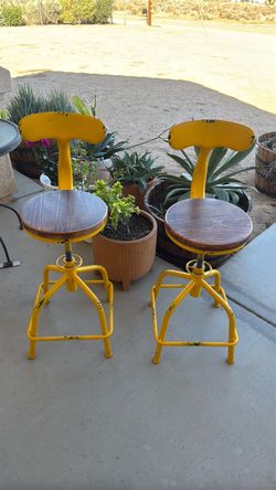 Vintage industrial adjustable swivel barstool pair