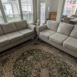 A Pair of Three Seater Sofas Set