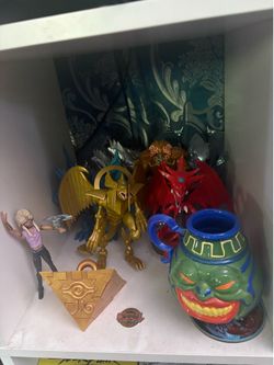 Yugioh statue puzzle and pot lot