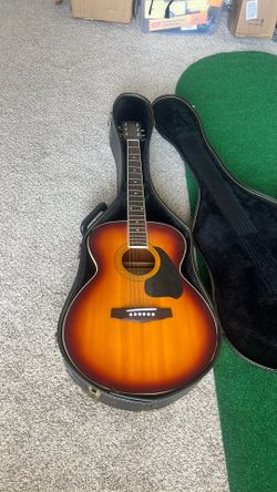 Guitar with hard case and stand! Mint condition