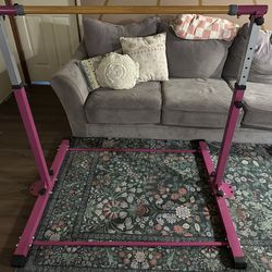 Pink gymnastics bar