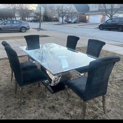 Dining room table with chairs