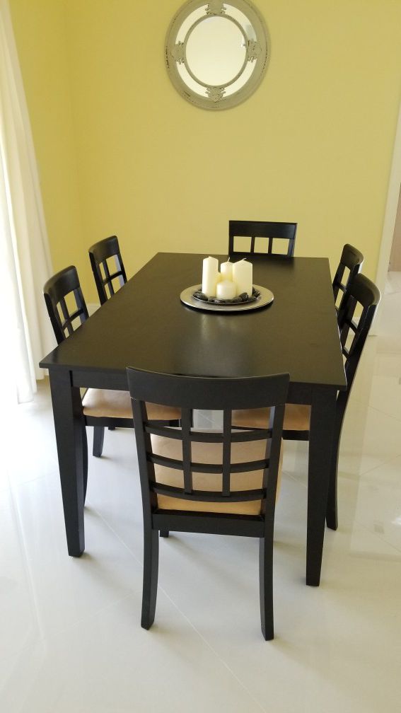 Six chairs and dinning table black