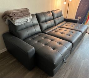 Meriweather Leather Dual Retracting Chaise Lounge Couch with chaise storage