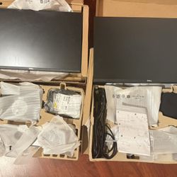 Two New in Box Dell 21” Computer Screens with Jabra Audiosets and Original Stands