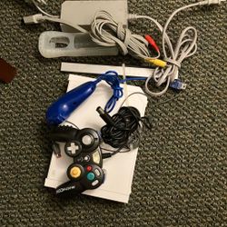 Nintendo Wii with games and accessories(needs wiimote)