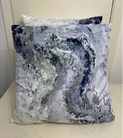 2 blue pillows