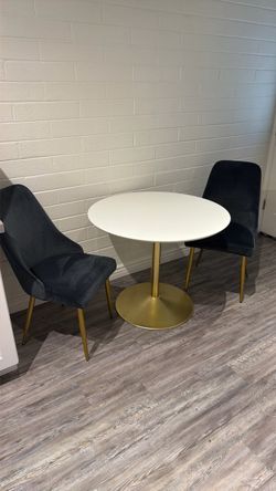 Dining table and two chairs