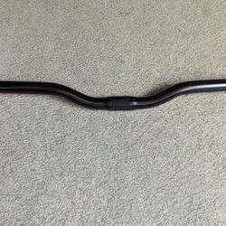 NEW M.T.B. BICYCLE HANDLEBAR, 25.4 MM AT CENTER SEE PICTURES FOR SPECS