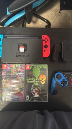 Nintendo Switch + Pro controller + 3 games