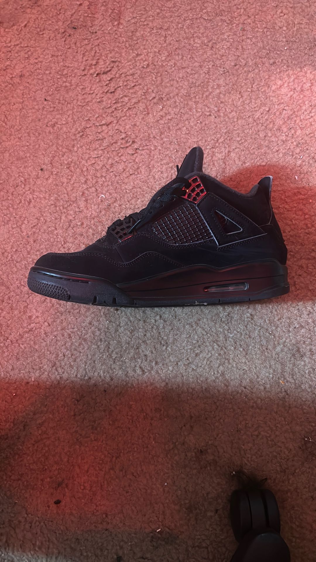 Black Cat Jordan 4’s