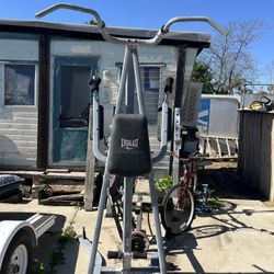 Pull Up Bar, Abb Machine, And Punching Bag Combo