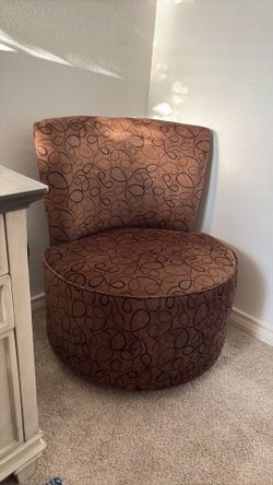 Brown swivel chair