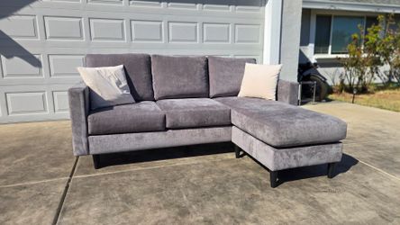 Free Delivery// Sectional sofa by Living spaces