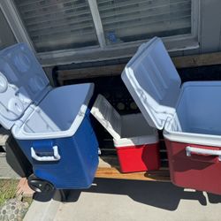 3 Coolers Small red $10- Big Red $25_ Blue On Wheels $30 Firm In Prices 