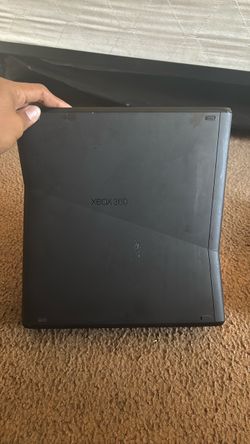 Microsoft Xbox 360 Console Black, Xbox1 console, and Nintendo Wii.