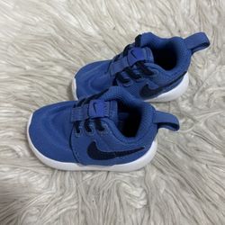 Blue Nikes Size 2C