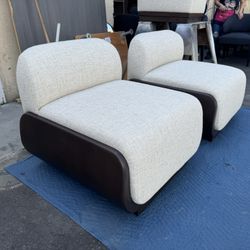 WALNUT UPHOLSTERED LOUNGE CHAIRS 