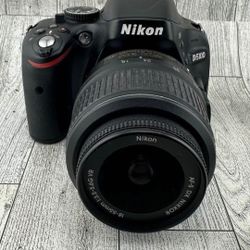 nikon d5100 with charger battery and extras