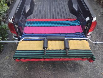 TITAN  ASSISTED  OLYMPIC  SQUAT  BAR 
  : makes squatting easier