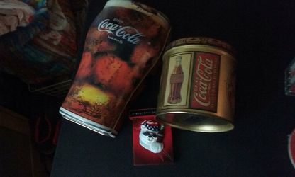 Coca-Cola tins and magnet