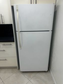 White GE refrigerator 33 inches wide