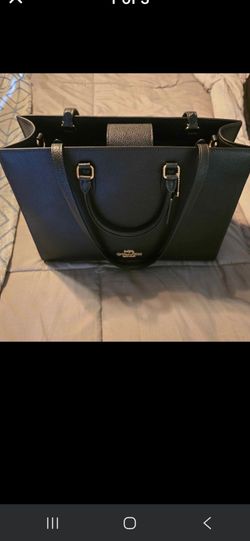 I have a black coach purse with matching little bags that go in the purse