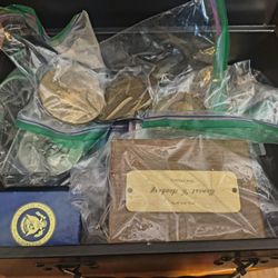 A lot of bronze and silver medallions. If you collect these medallions. 